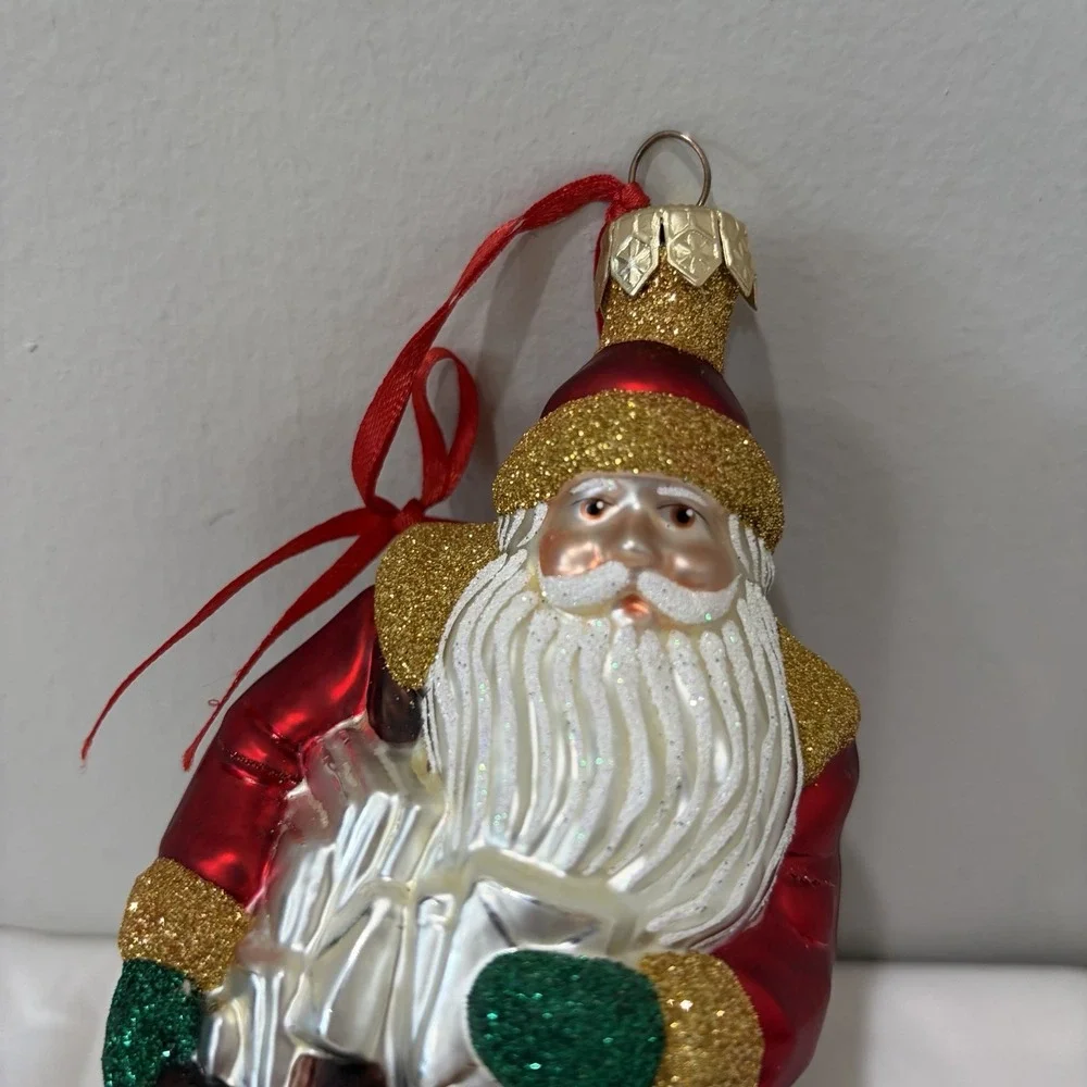 1999 Patricia Breen Through Rain and‎ Snow Santa Ornament Red Coat Bag Glass Vtg